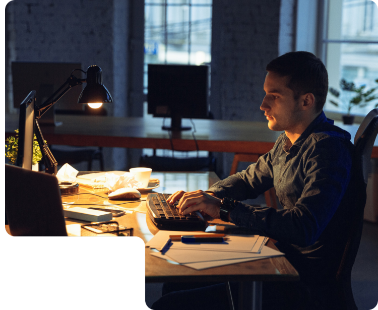 Person working on computer in a lab/office setting